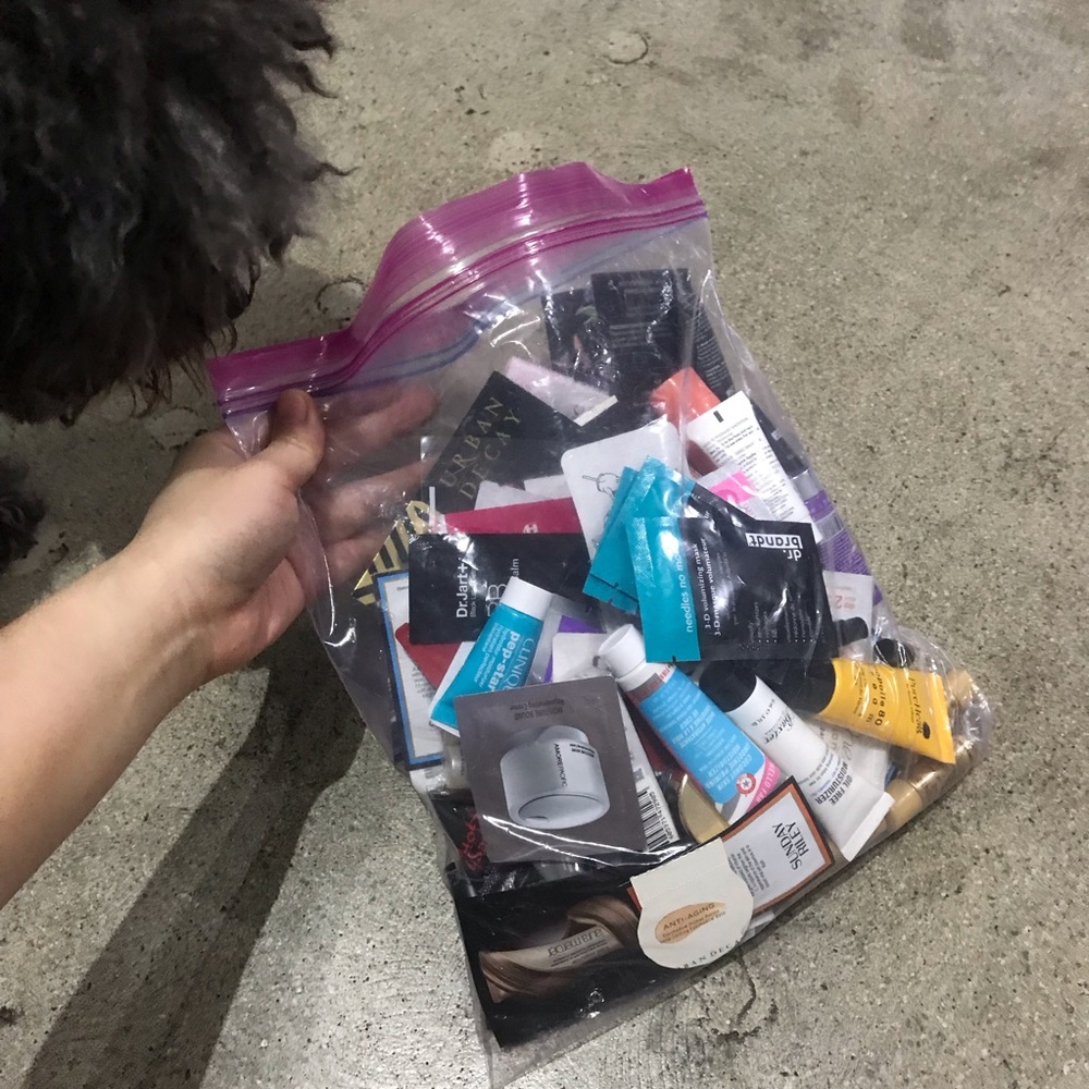 Giant ziploc full of sample and travel sizes